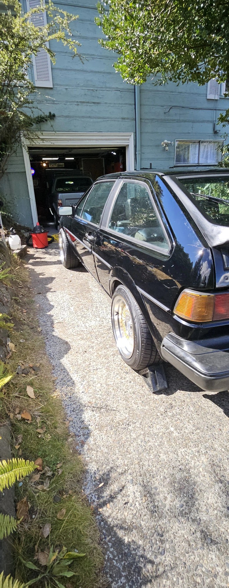 1988 VW Scirocco after detail — rear quarter, wheels polished